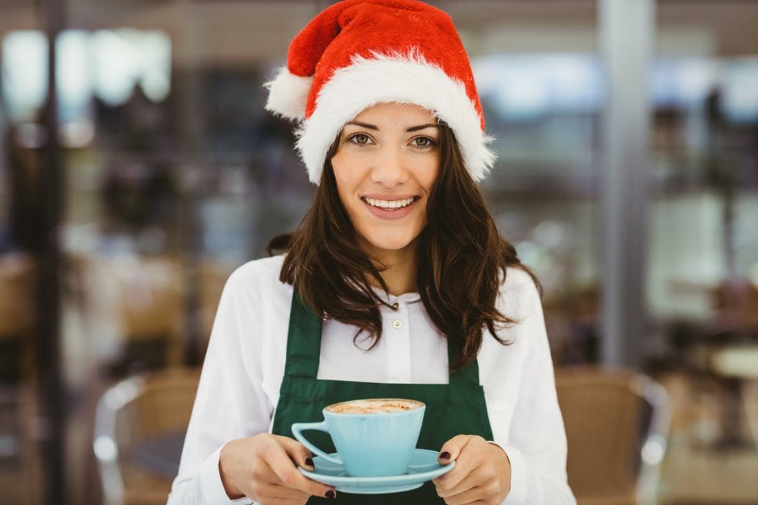 Student working at a cafe for Christmas period